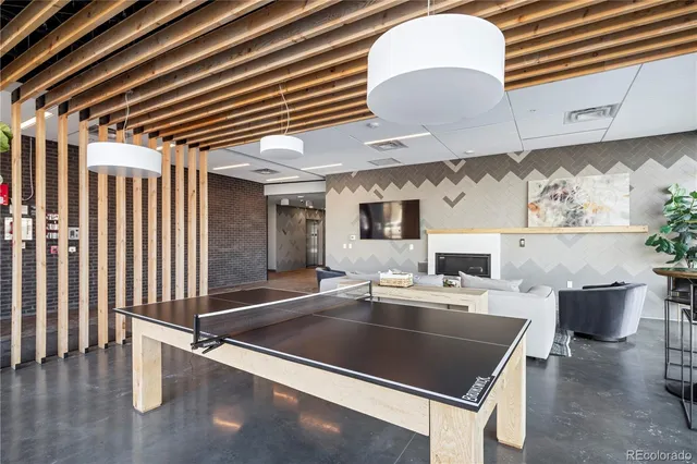 a kitchen with a sink appliances and cabinets
