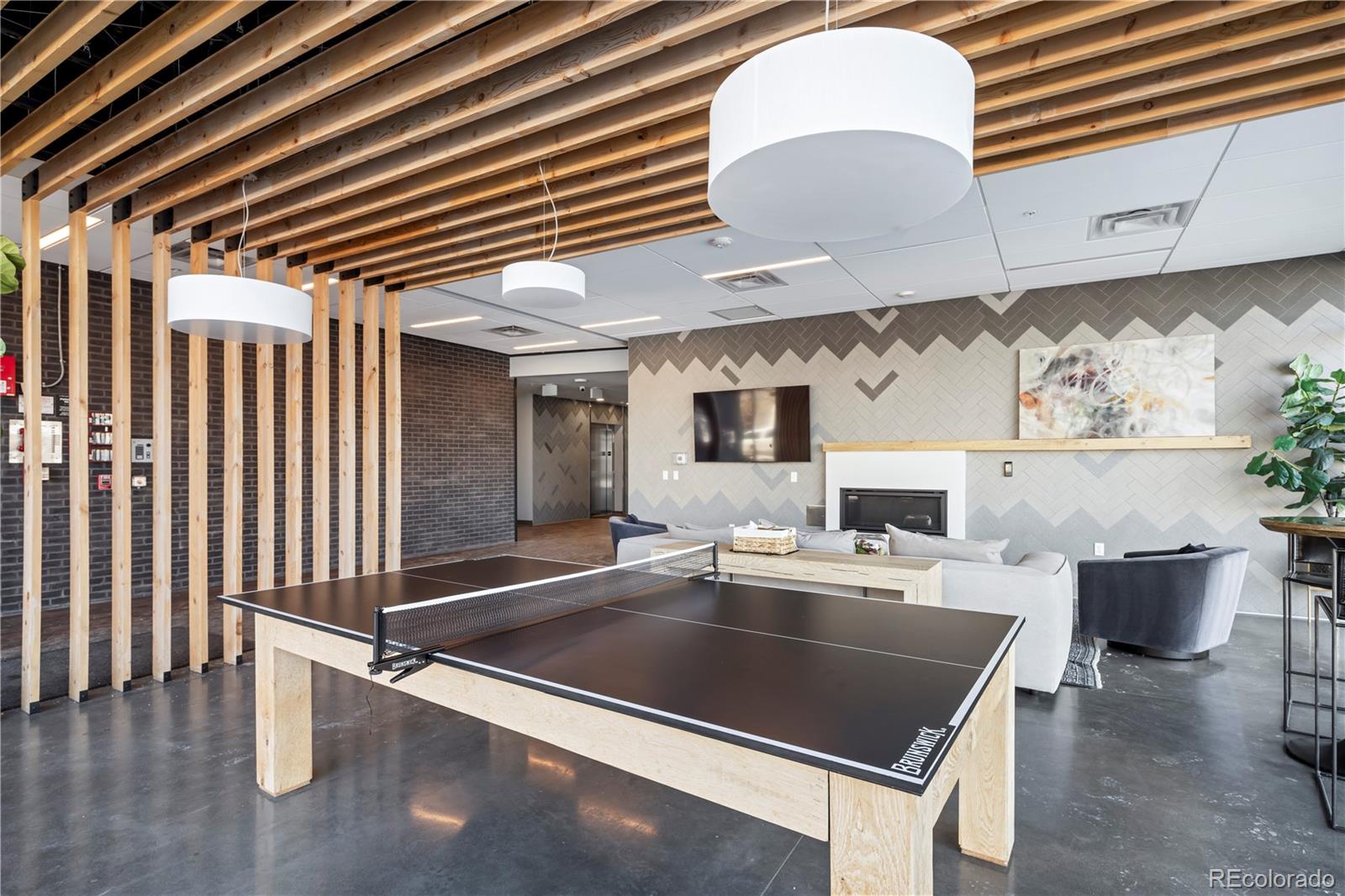 1898 South Bannock Street, Unit 103 Denver, CO 80223 - Photo 17 of 22 a kitchen with a sink appliances and cabinets