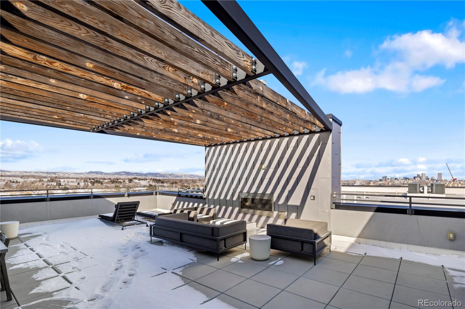 1898 South Bannock Street, Unit 103 Denver, CO 80223 - Photo 19 of 22 a view of roof with seating space