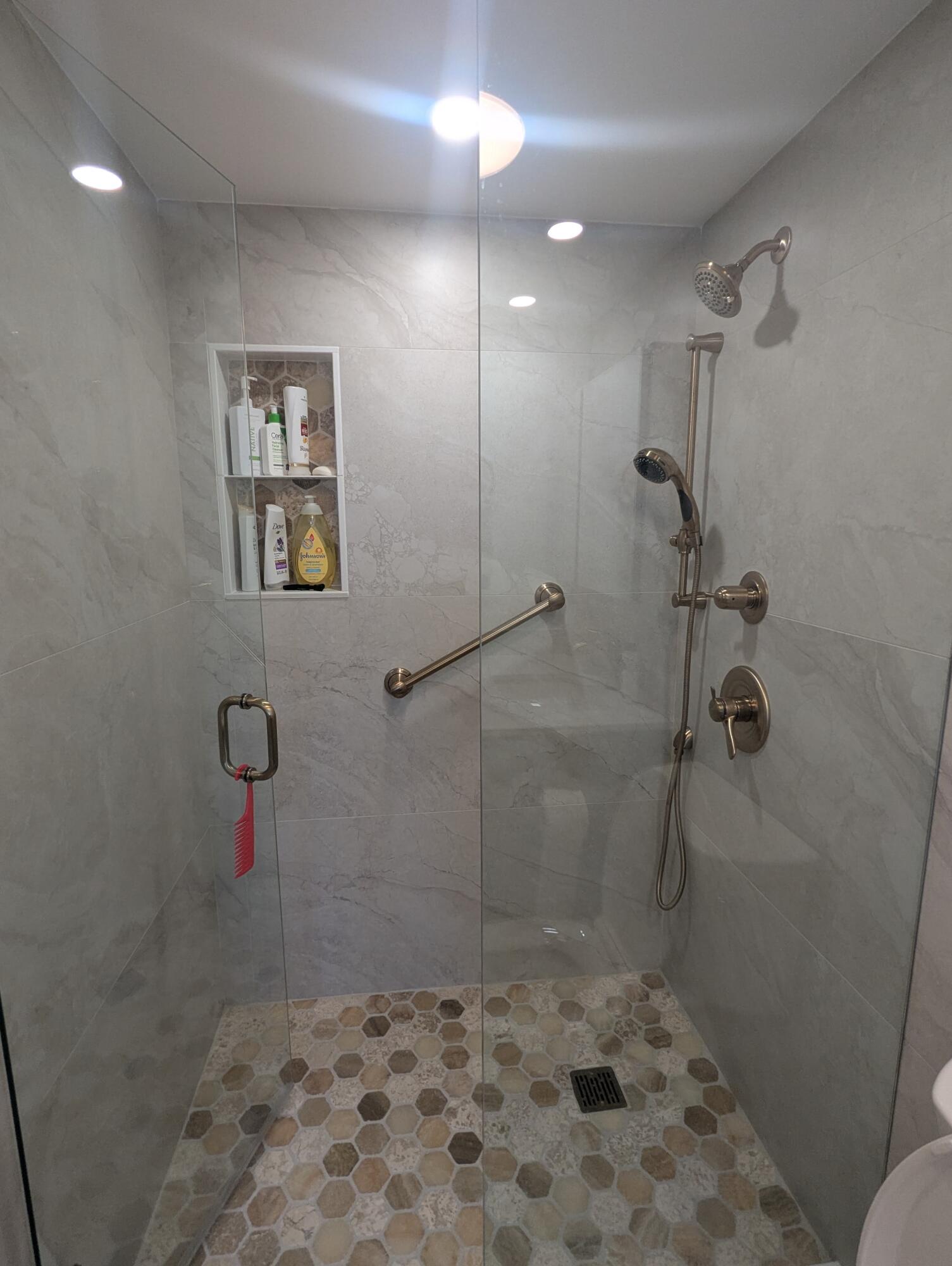 2121 North Ocean Boulevard, Unit 1006E Boca Raton, FL 33431 - Photo 39 of 64 a bathroom with a shower