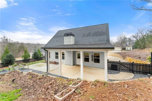 a house view with a backyard space