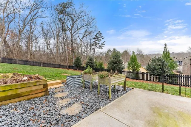 a garden view with a seating space