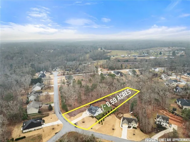a view of a balcony with two chairs