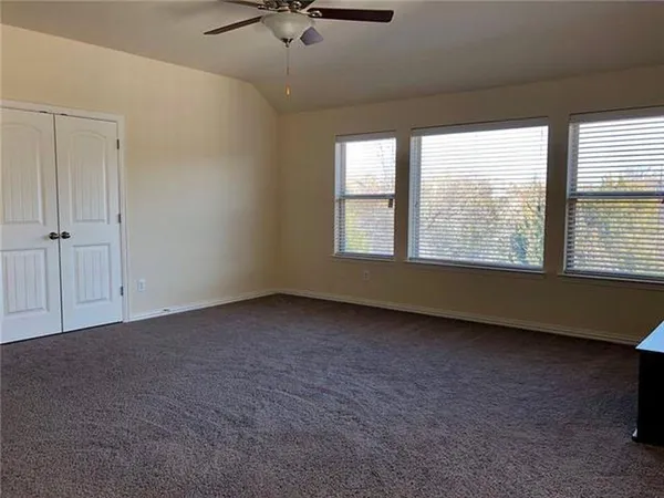 a room with a table and a mirror