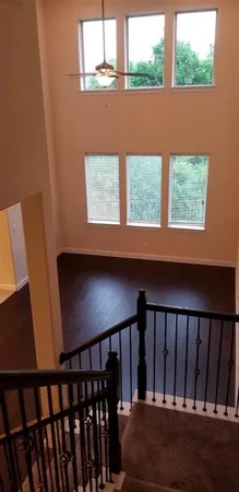 a bathroom with a granite countertop sink a shower and a mirror