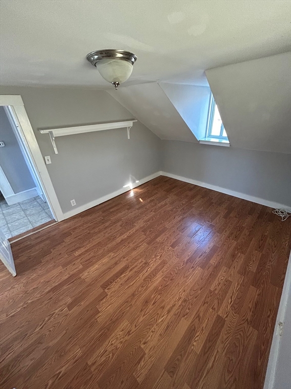 441 King Street, Unit G Littleton, MA 01460 - Photo 5 of 7 wooden floor in an empty room