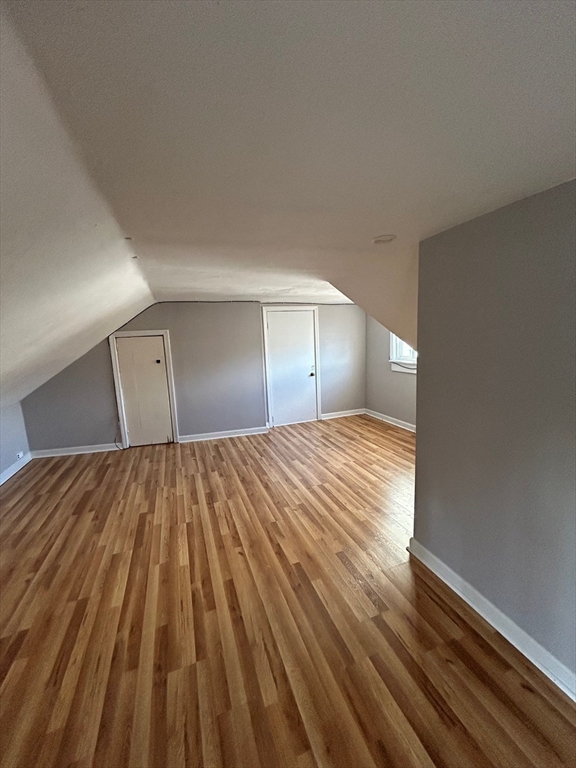 441 King Street, Unit G Littleton, MA 01460 - Photo 6 of 7 a bedroom with a bed and closet