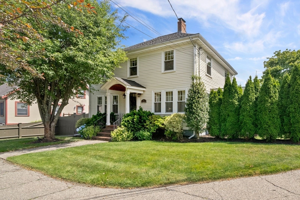 1111 Brook Road Milton, MA 02186 - Photo 22 of 22 a front view of a house with a yard