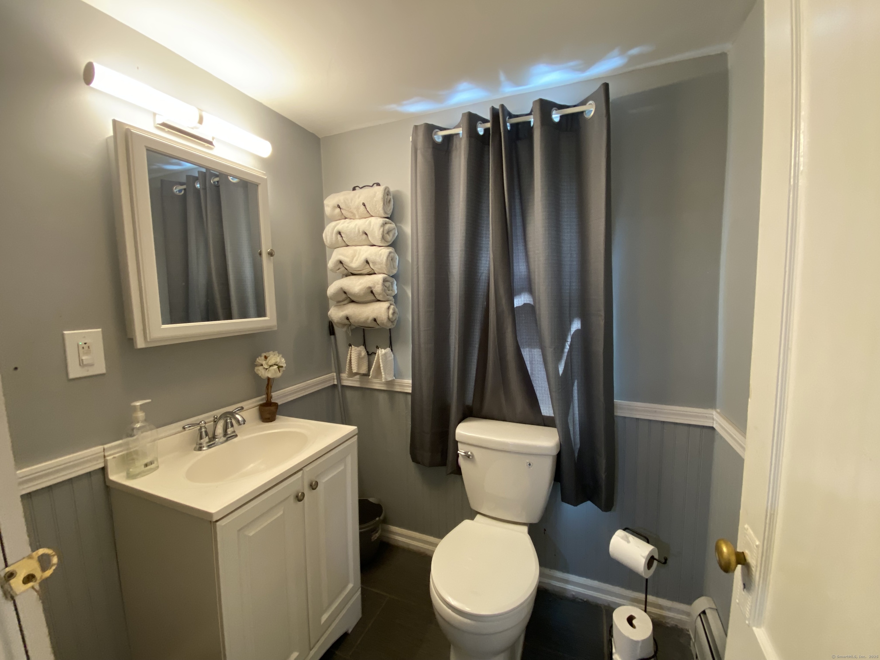148 Hillside Avenue Torrington, CT 06790 - Photo 12 of 38 a bathroom with a toilet sink and shower