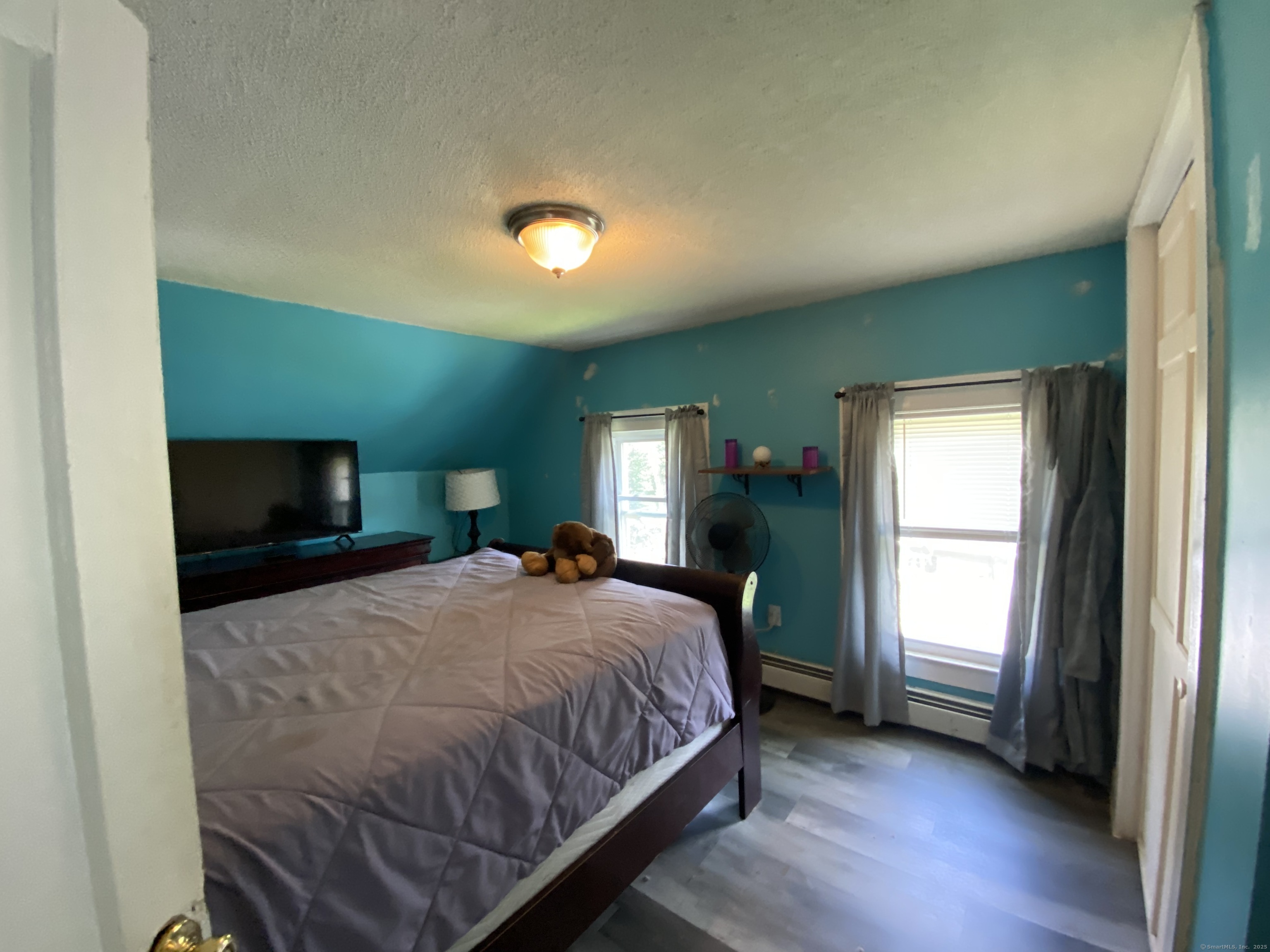 148 Hillside Avenue Torrington, CT 06790 - Photo 14 of 38 a bedroom with a bed and a window