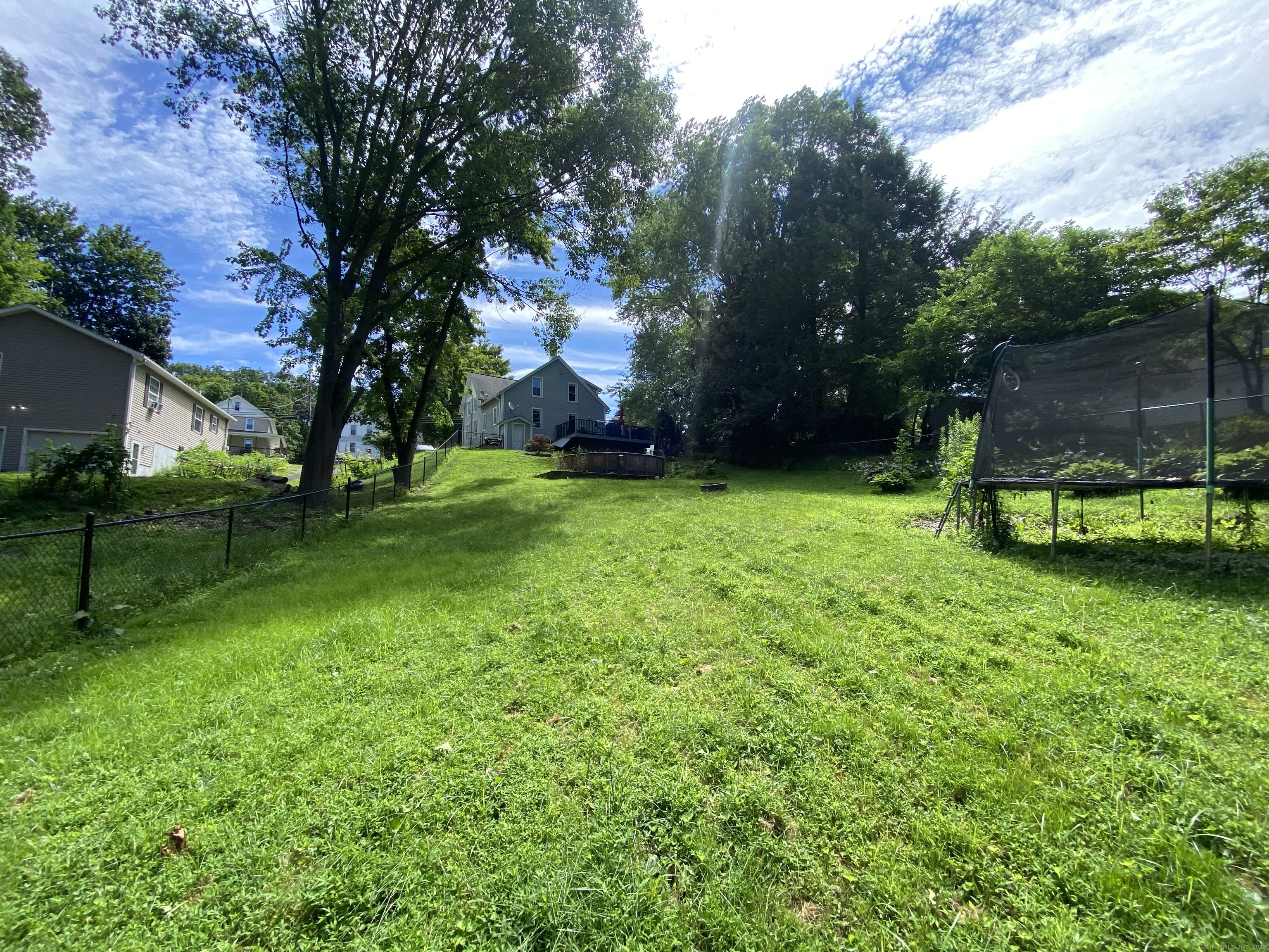 148 Hillside Avenue Torrington, CT 06790 - Photo 37 of 38 a view of a backyard with a garden