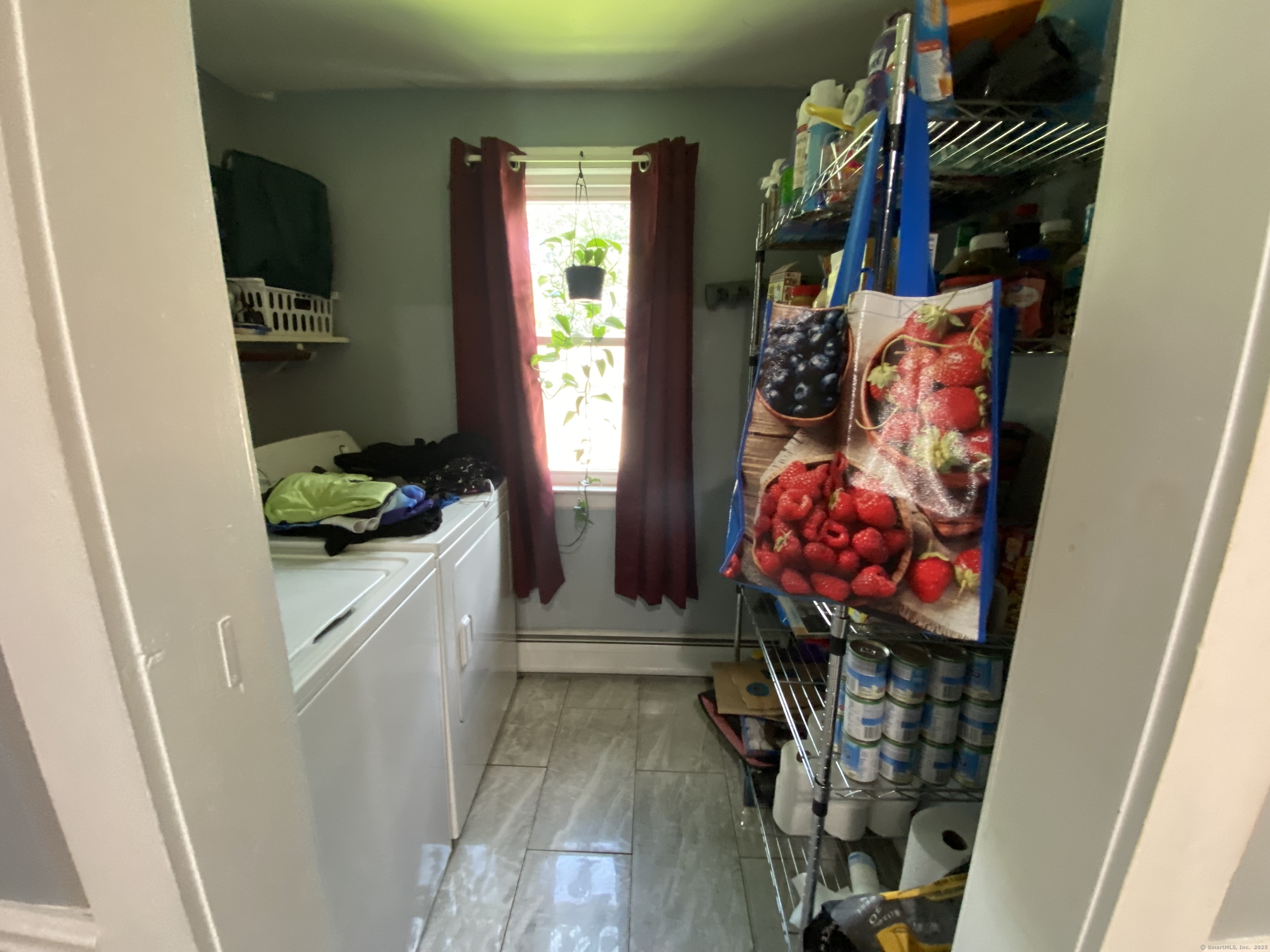 148 Hillside Avenue Torrington, CT 06790 - Photo 10 of 38 a view of walk in closet with clothes and shoes