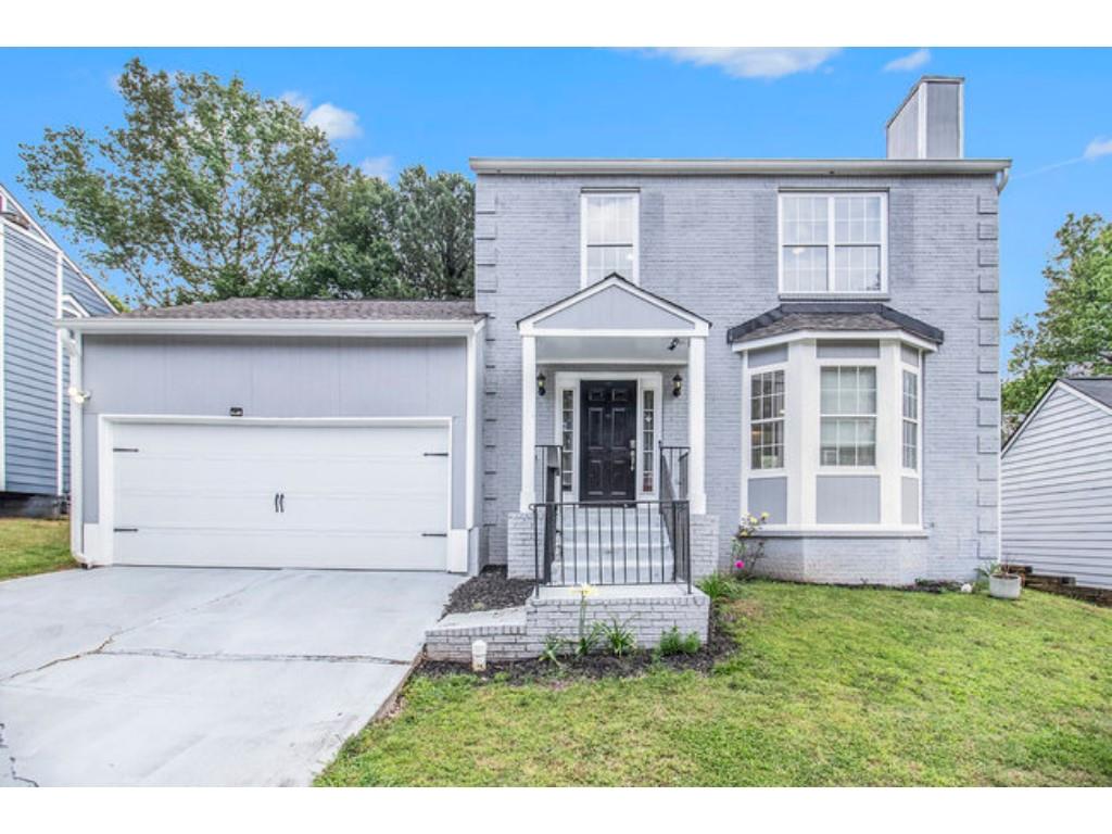 3451 Kingsbrooke Way Decatur, GA 30034 - Photo 1 of 1 a front view of a house with a yard