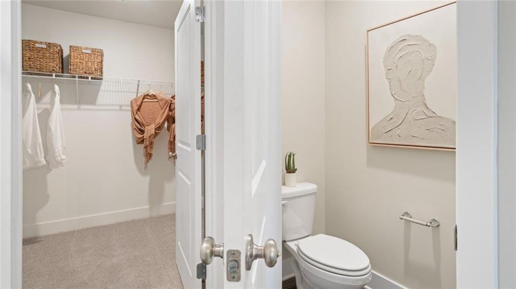 1087 Peachtree Road Carnegie, PA 15106 - Photo 12 of 20 a white toilet sitting next to a bathroom sink