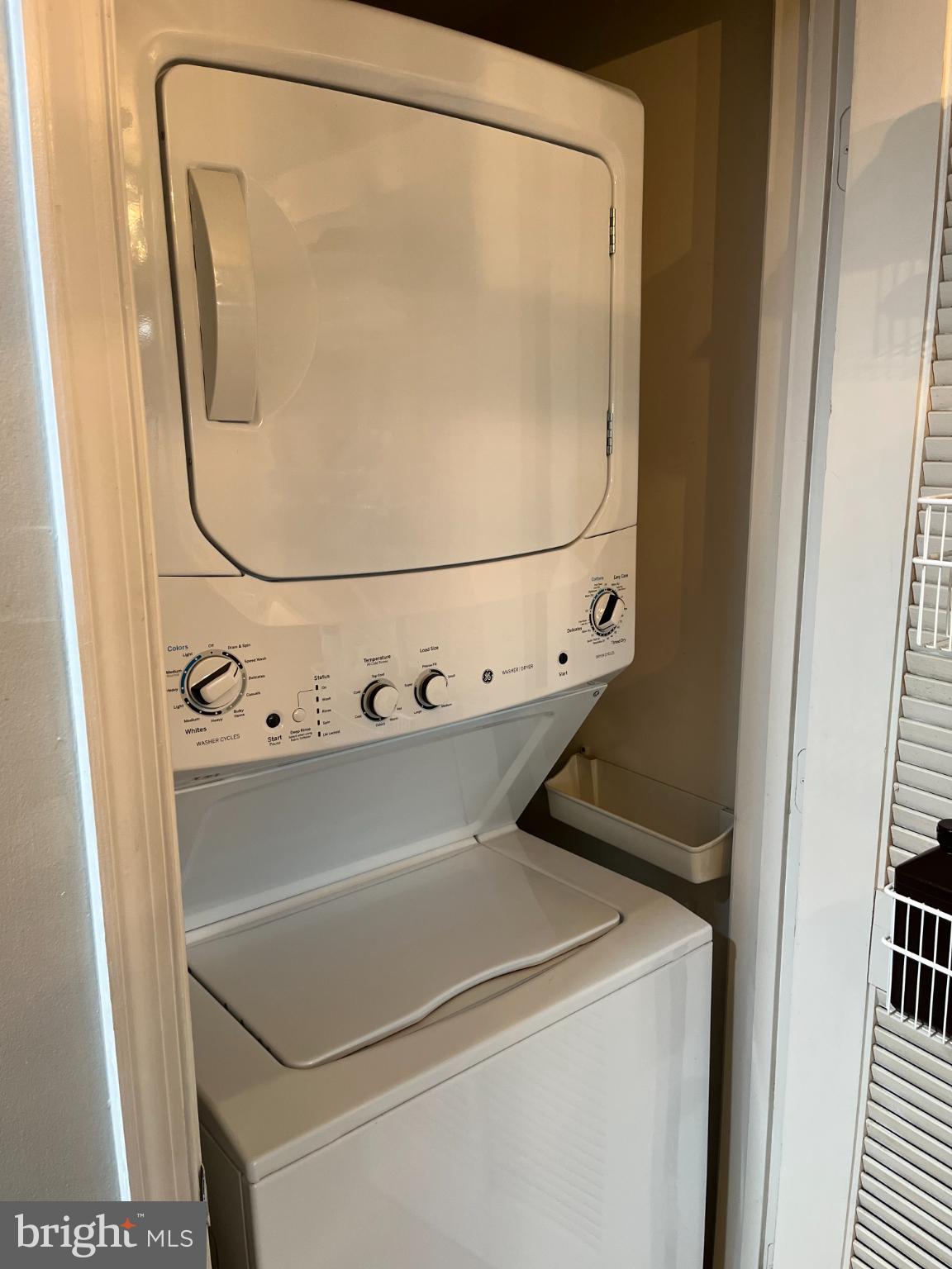 2609 Douglass Road Southeast, Unit 402 Washington, DC 20020 - Photo 14 of 35 a close up view of washer and dryer