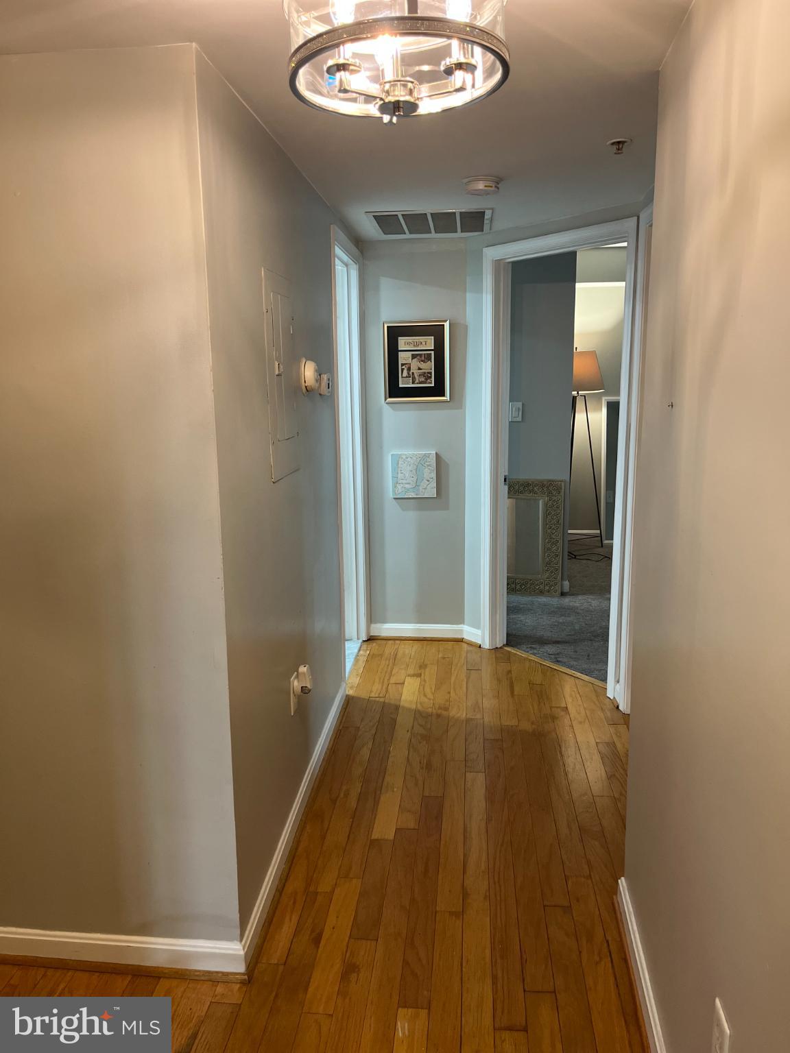 2609 Douglass Road Southeast, Unit 402 Washington, DC 20020 - Photo 15 of 35 wooden floor in a gallery