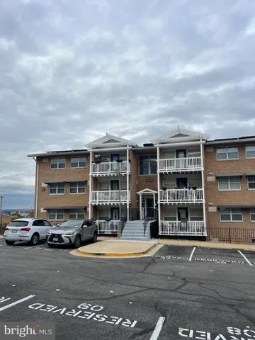 a car parked in front of a building