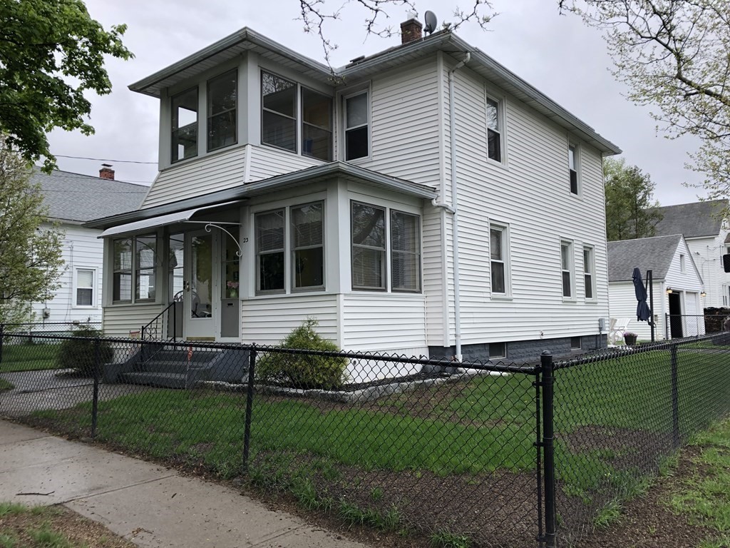 23 Acton Street Springfield, MA 01151 - Photo 1 of 33 a view of a house with a yard