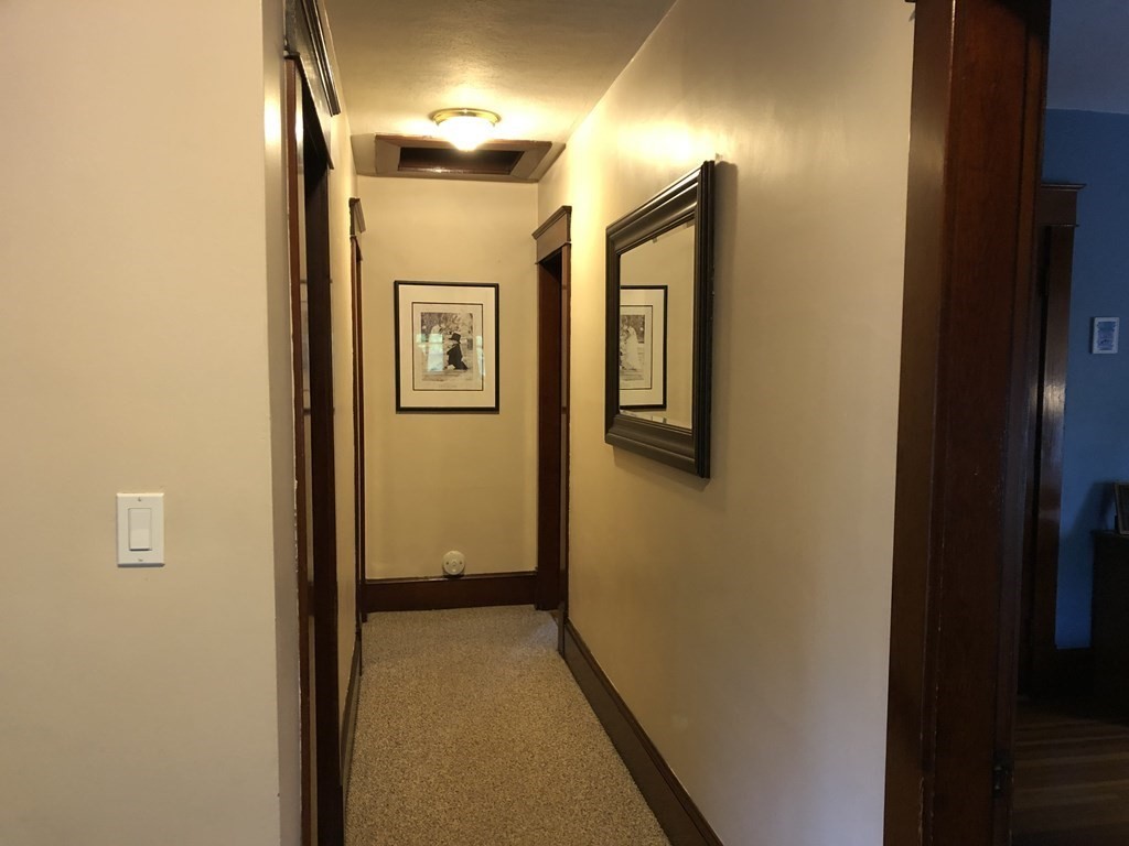 23 Acton Street Springfield, MA 01151 - Photo 17 of 33 a view of a hallway