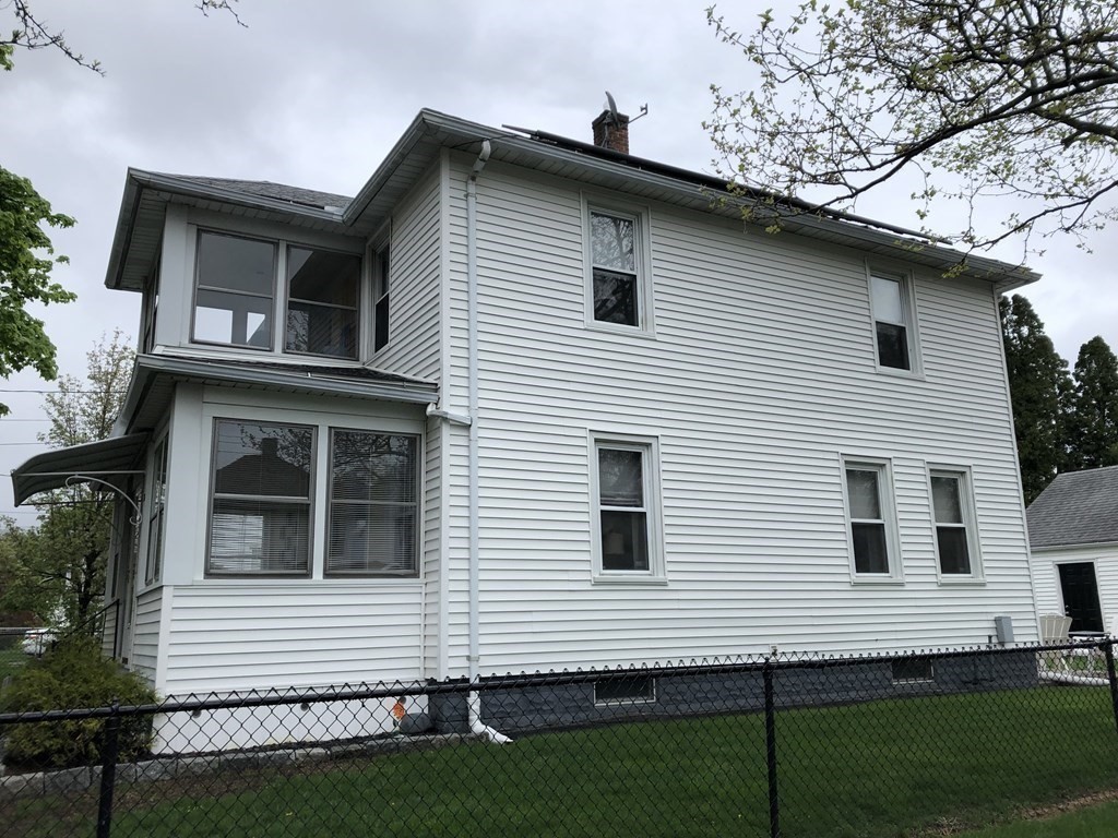 23 Acton Street Springfield, MA 01151 - Photo 28 of 33 a view of the house with a yard
