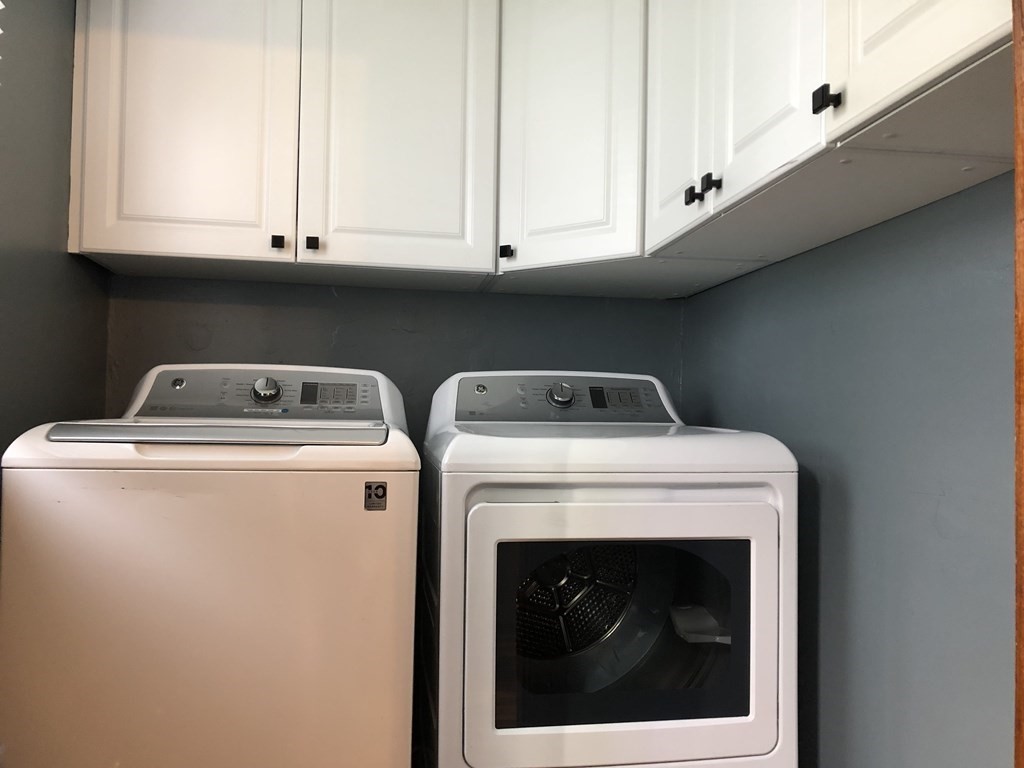 23 Acton Street Springfield, MA 01151 - Photo 8 of 33 a utility room with dryer and washer
