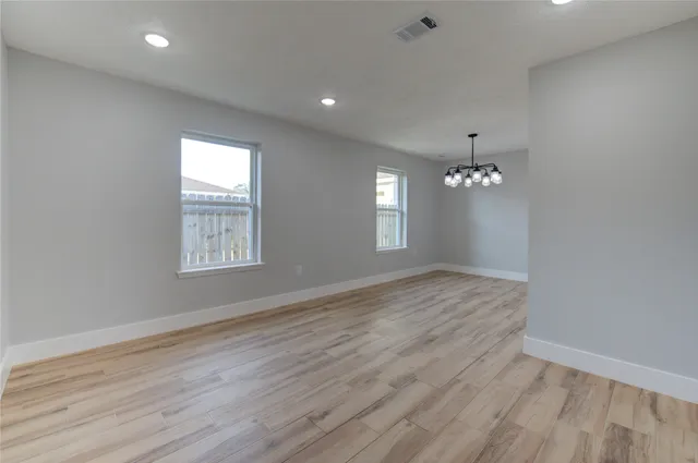 a kitchen with stainless steel appliances a refrigerator and a sink