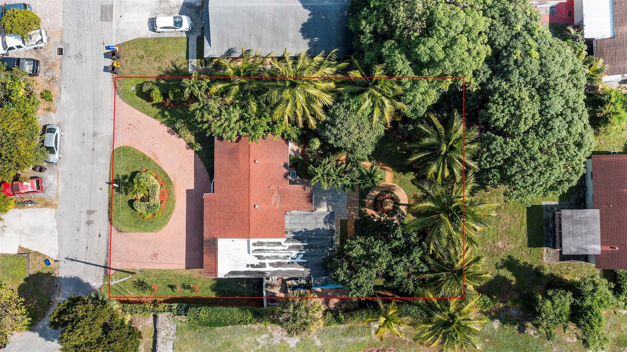946 Alamanda Road West Palm Beach, FL 33405 - Photo 18 of 56 an aerial view of a house with garden space and sitting area