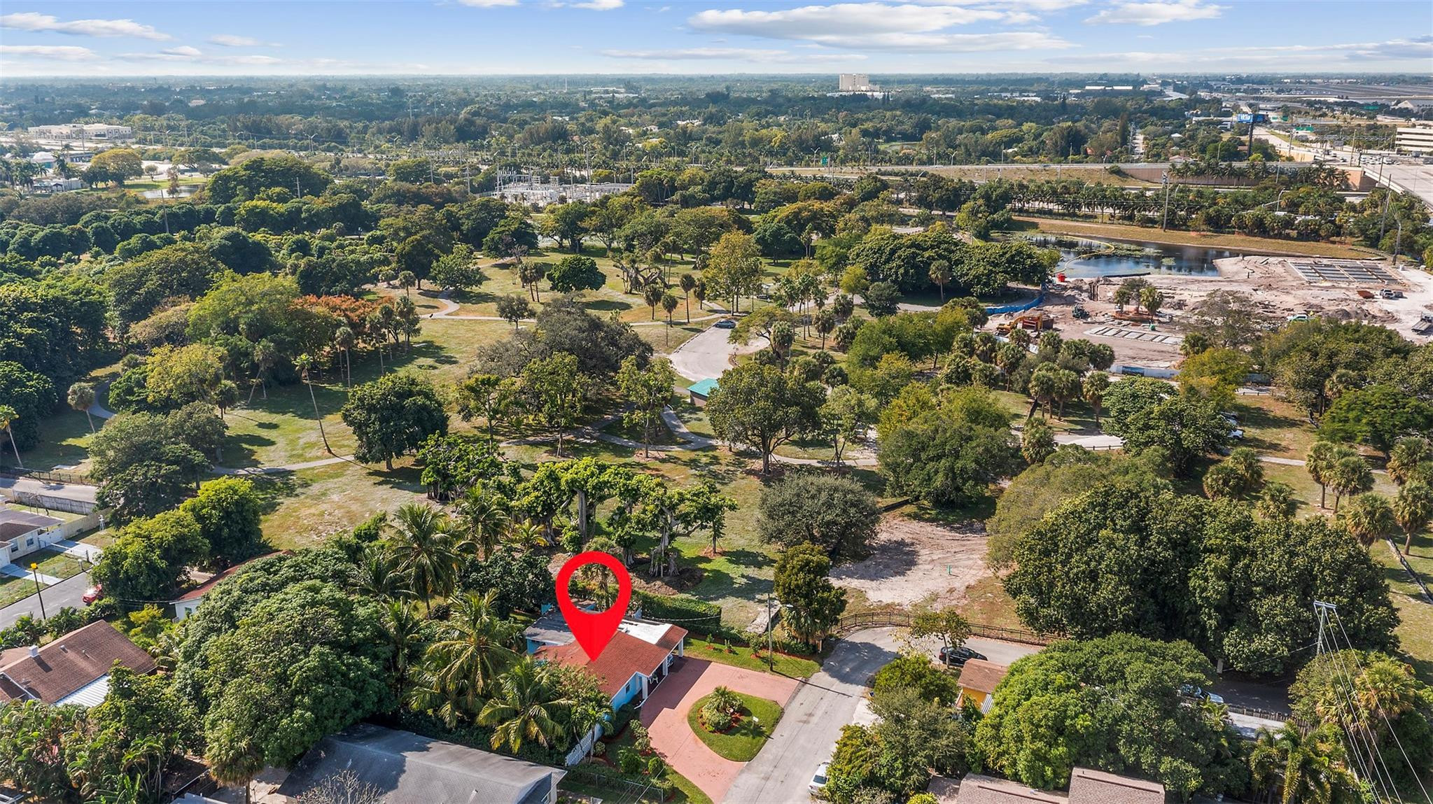 946 Alamanda Road West Palm Beach, FL 33405 - Photo 27 of 56 an aerial view of residential houses with city and ocean view