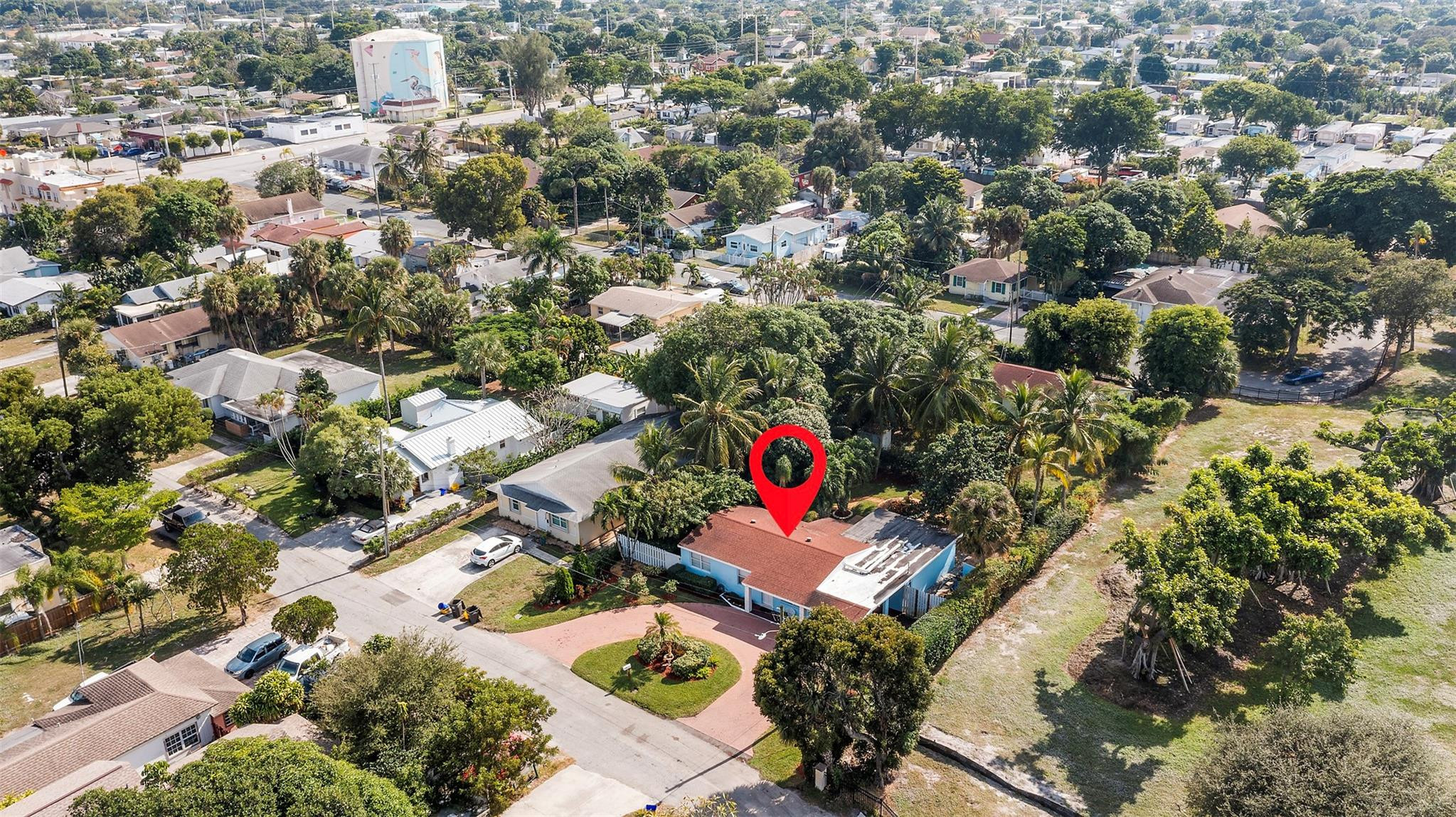 946 Alamanda Road West Palm Beach, FL 33405 - Photo 28 of 56 an aerial view of residential houses with outdoor space
