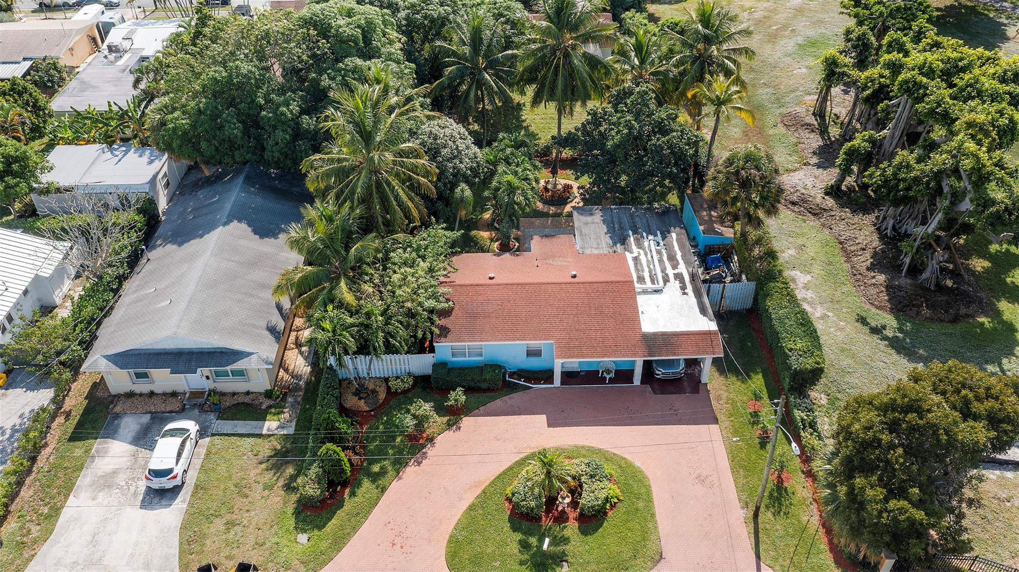 946 Alamanda Road West Palm Beach, FL 33405 - Photo 3 of 56 an aerial view of a house with garden space and lake view