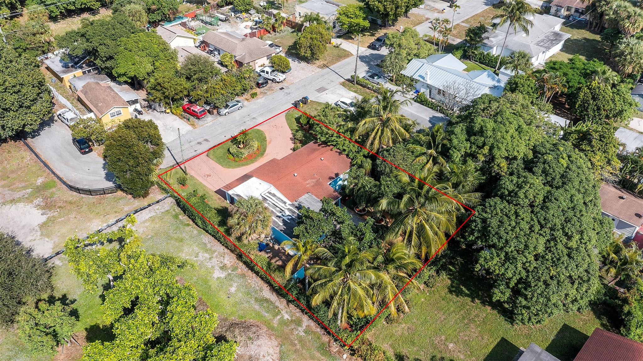 946 Alamanda Road West Palm Beach, FL 33405 - Photo 31 of 56 an aerial view of residential house with swimming pool