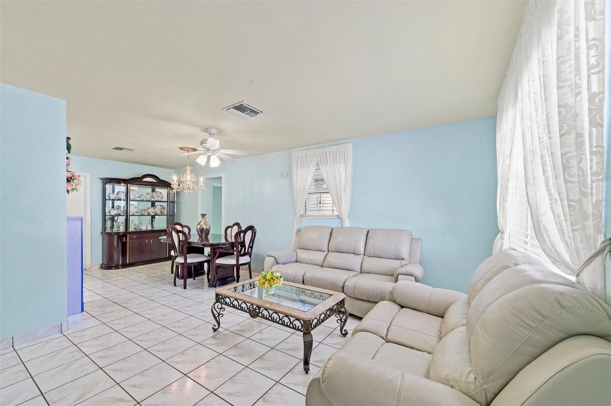 946 Alamanda Road West Palm Beach, FL 33405 - Photo 33 of 56 a living room with furniture and a window