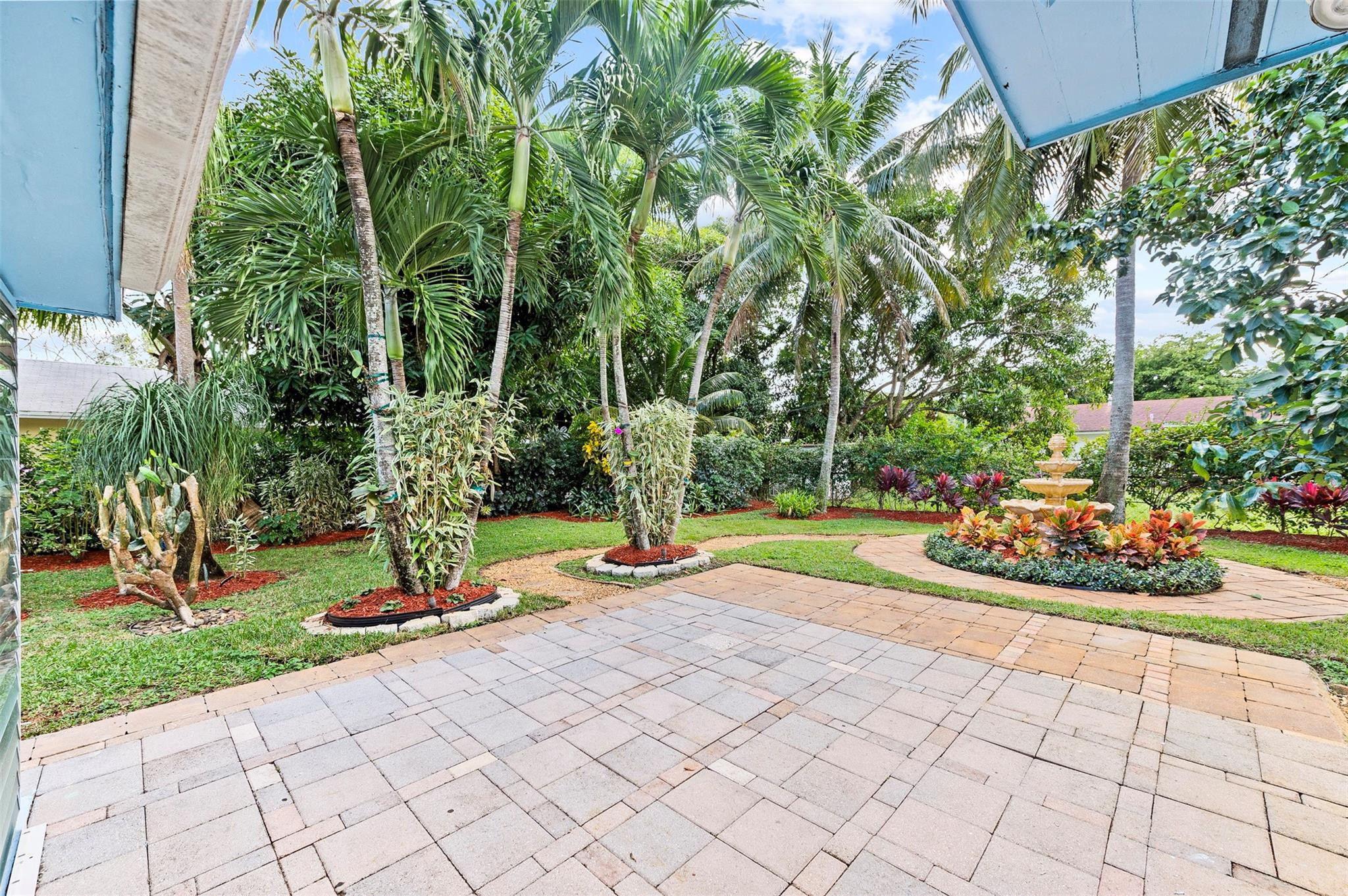 946 Alamanda Road West Palm Beach, FL 33405 - Photo 40 of 56 a view of a chair and table of the garden