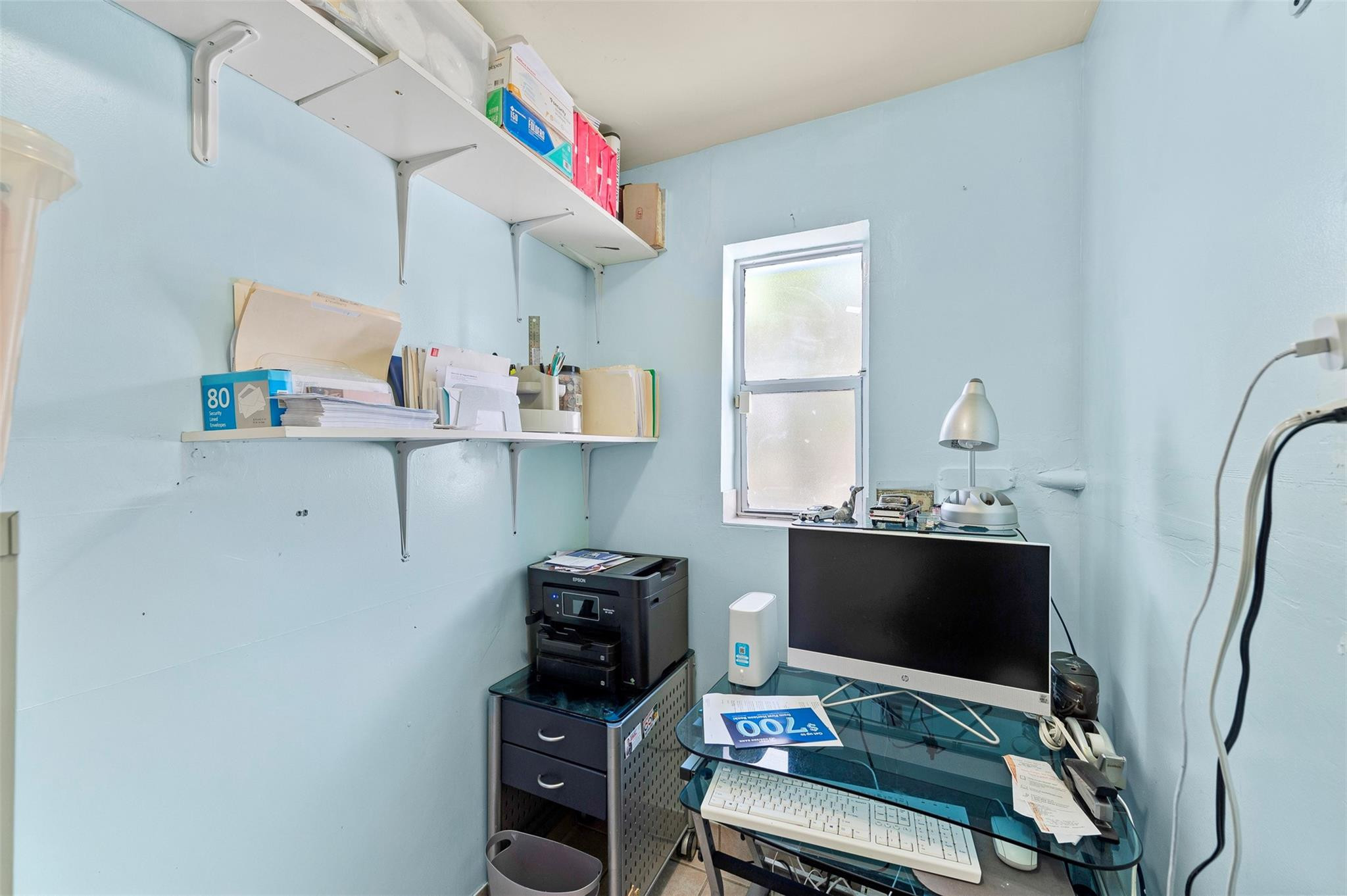 946 Alamanda Road West Palm Beach, FL 33405 - Photo 42 of 56 a view of workspace with wooden floor shelves