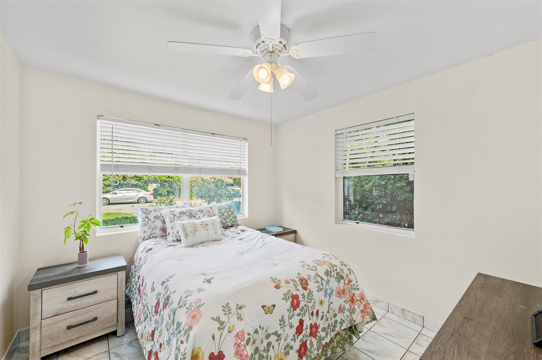 946 Alamanda Road West Palm Beach, FL 33405 - Photo 49 of 56 a bedroom with a bed and a window