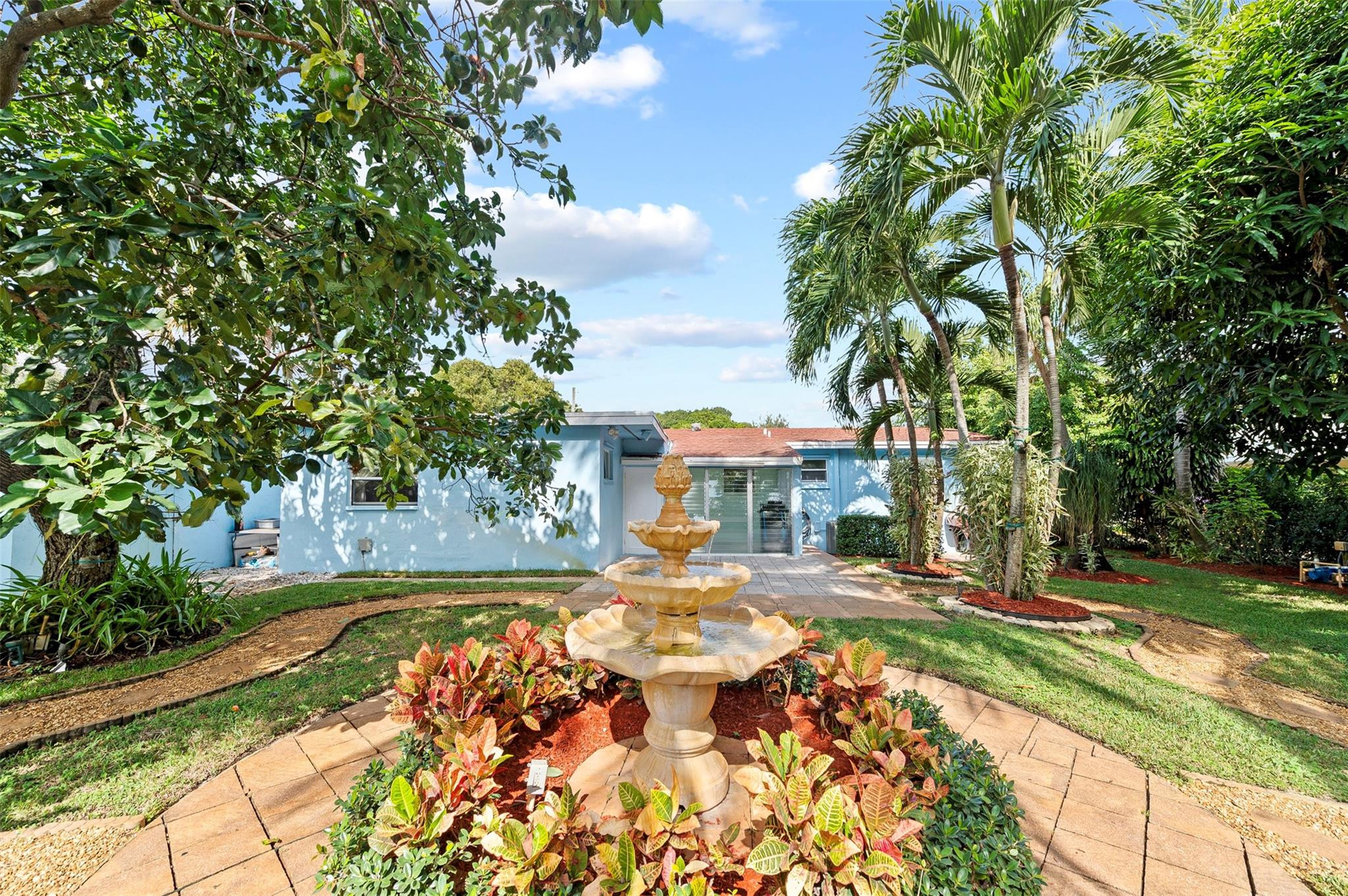 946 Alamanda Road West Palm Beach, FL 33405 - Photo 52 of 56 a front view of a house with a yard