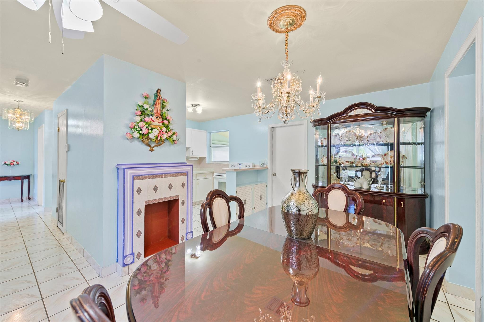 946 Alamanda Road West Palm Beach, FL 33405 - Photo 6 of 56 a view of a dining room with furniture and chandelier