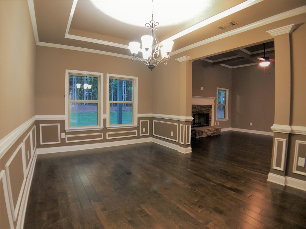 330 Walnut Grove Road Gray, GA 31032 - Photo 18 of 42 a view of an empty room with wooden floor and a window
