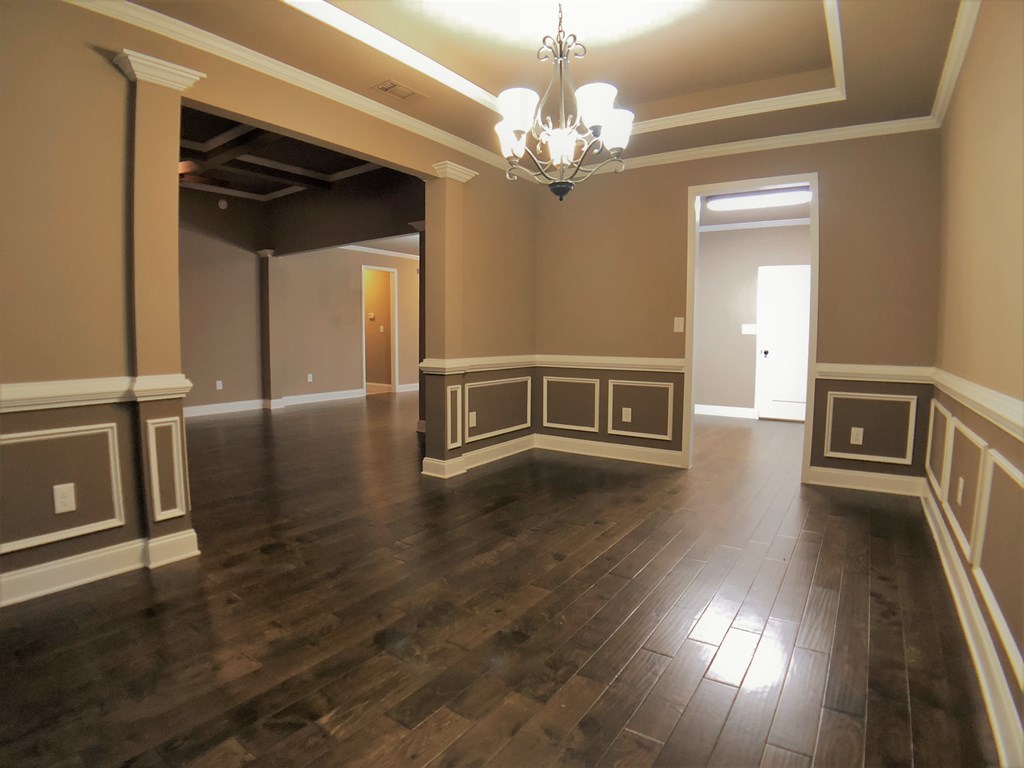330 Walnut Grove Road Gray, GA 31032 - Photo 19 of 42 a view of a livingroom with wooden floor and stairs