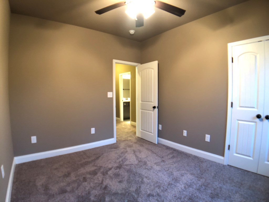 330 Walnut Grove Road Gray, GA 31032 - Photo 25 of 42 an empty room and chandelier fan