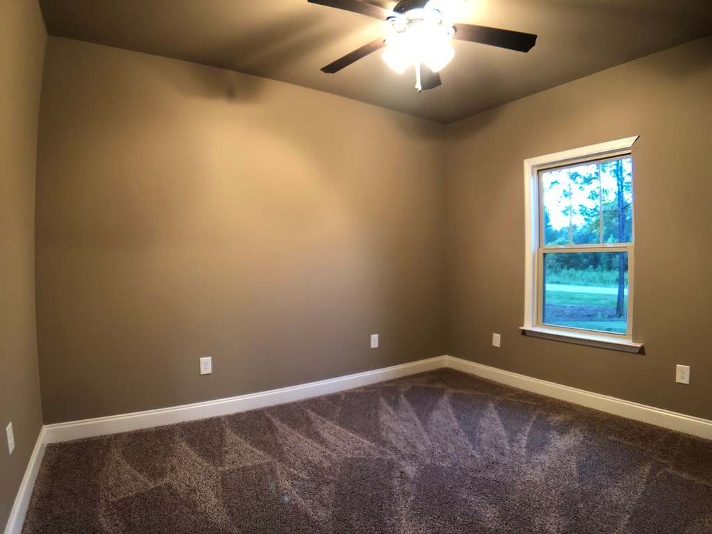 330 Walnut Grove Road Gray, GA 31032 - Photo 27 of 42 an empty room with a window