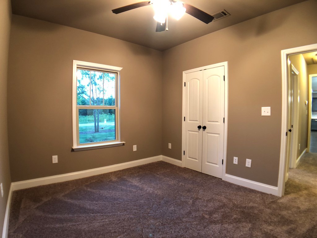 330 Walnut Grove Road Gray, GA 31032 - Photo 28 of 42 an empty room with windows and closet