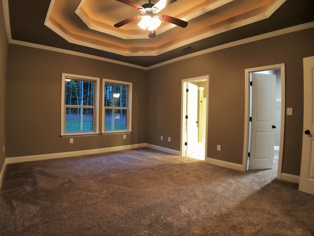 330 Walnut Grove Road Gray, GA 31032 - Photo 36 of 42 wooden floor and windows in an empty room