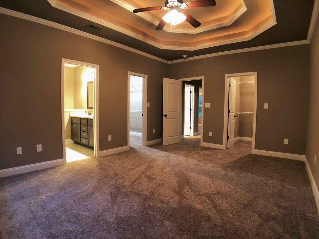 330 Walnut Grove Road Gray, GA 31032 - Photo 37 of 42 a view of an empty room with a chandelier