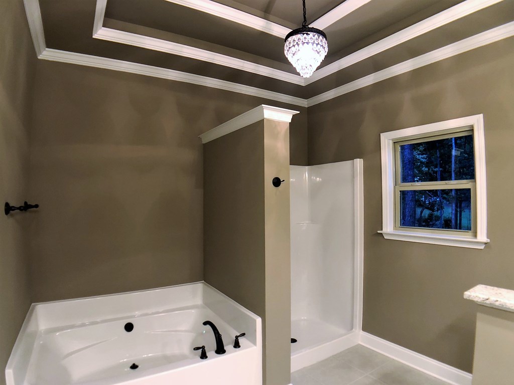 330 Walnut Grove Road Gray, GA 31032 - Photo 40 of 42 a bathroom with a bathtub and a shower