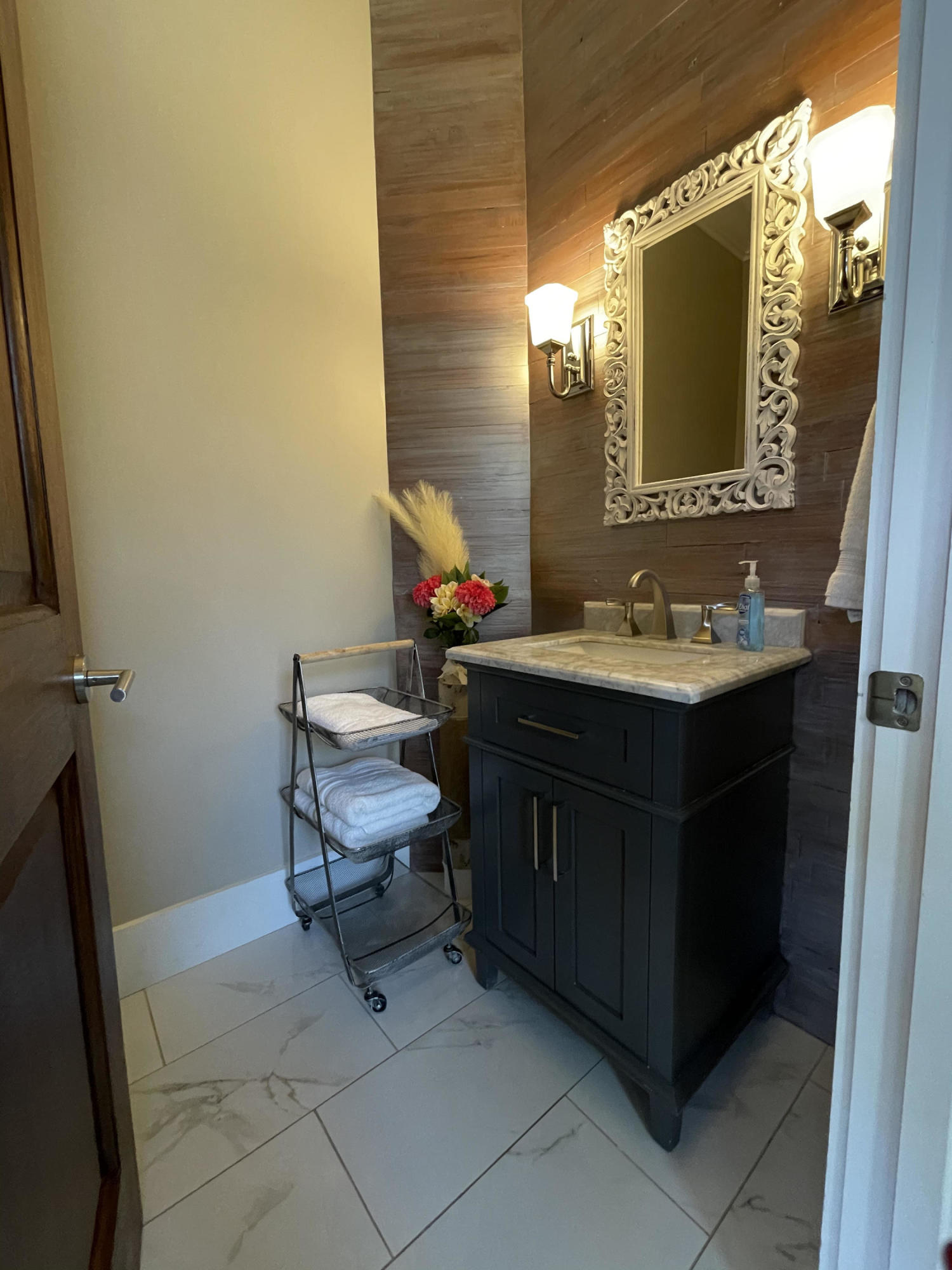 231 Rue St Tropez Miramar Beach, FL 32550 - Photo 16 of 26 a bathroom with a sink and a mirror