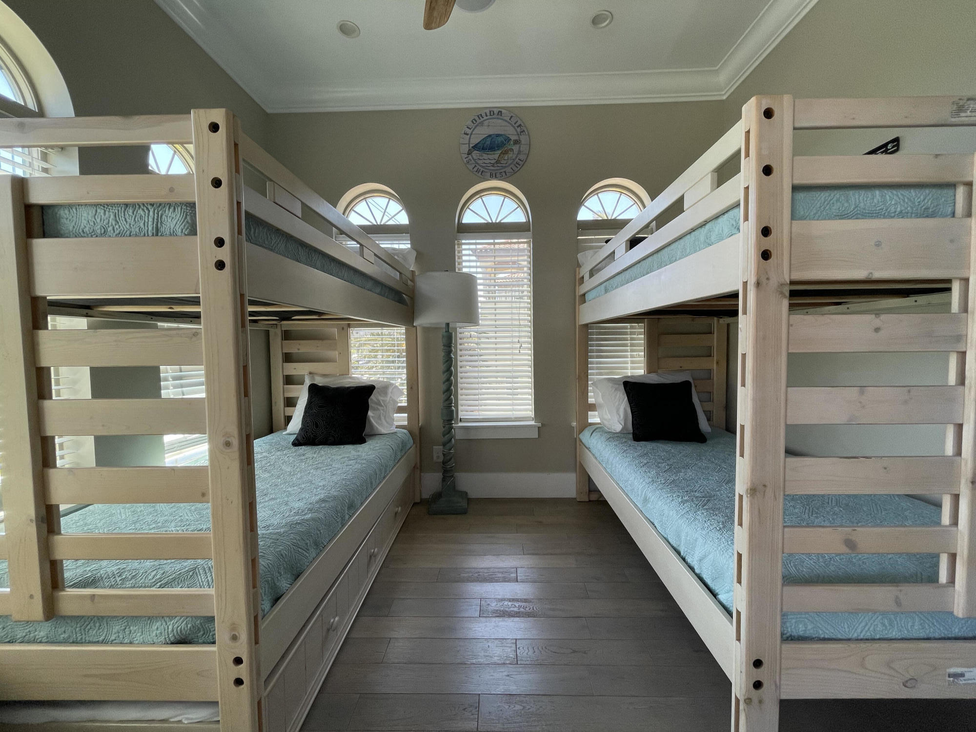 231 Rue St Tropez Miramar Beach, FL 32550 - Photo 17 of 26 a view of hallway with stairs and wooden floor