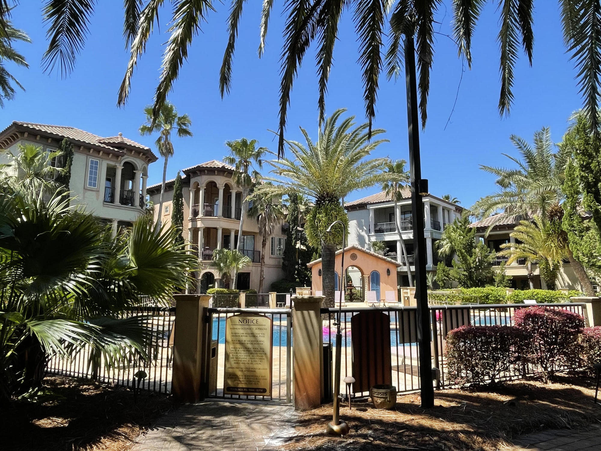 231 Rue St Tropez Miramar Beach, FL 32550 - Photo 24 of 26 a front view of a house with a tree