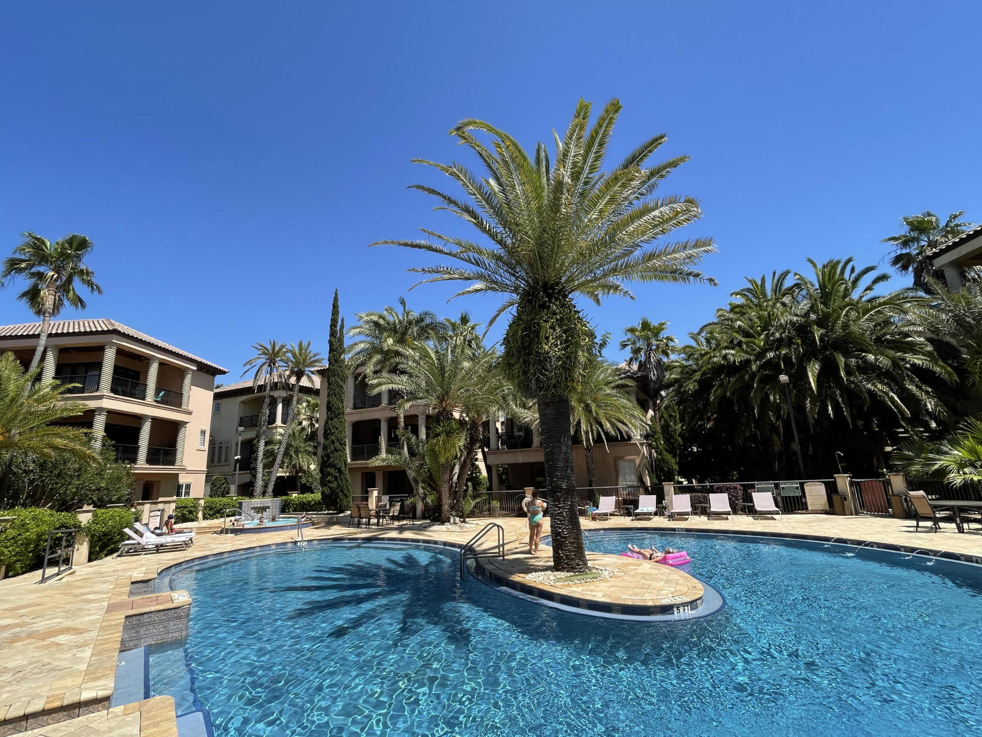 231 Rue St Tropez Miramar Beach, FL 32550 - Photo 26 of 26 a view of a house with swimming pool and sitting area