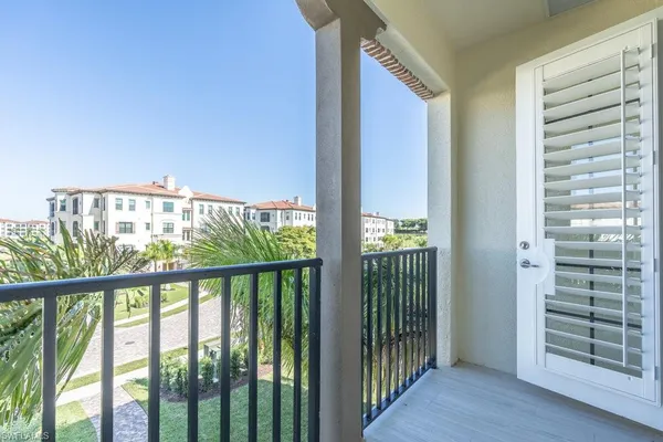 a view of a balcony with an outdoor space